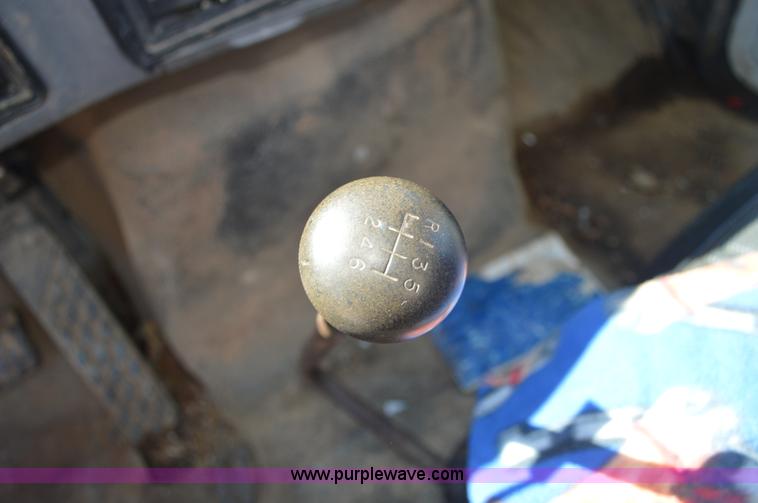 image for item BM9331 1999 Ford F800 flat bed truck with mud mixer