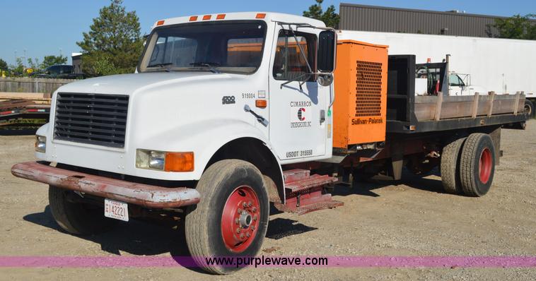image for item BM9332 1997 International 4700 flat dump bed truck