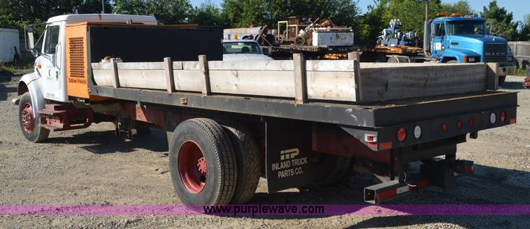 image for item BM9332 1997 International 4700 flat dump bed truck