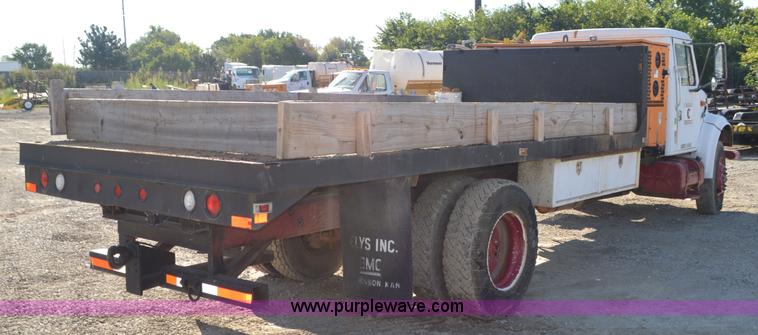 image for item BM9332 1997 International 4700 flat dump bed truck