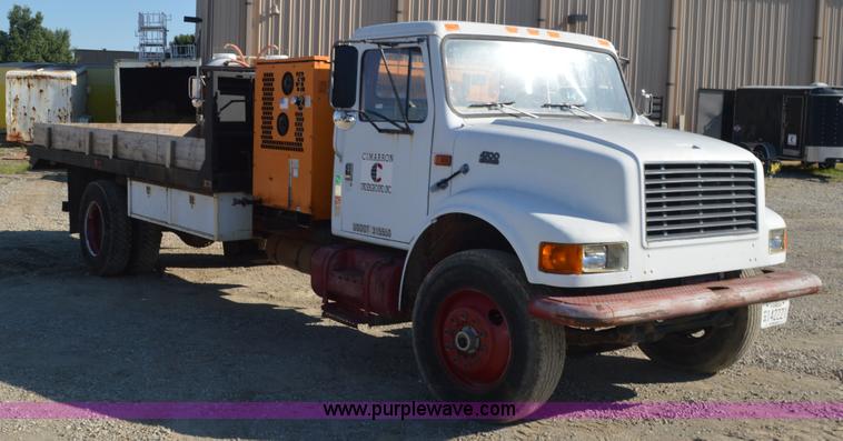 image for item BM9332 1997 International 4700 flat dump bed truck
