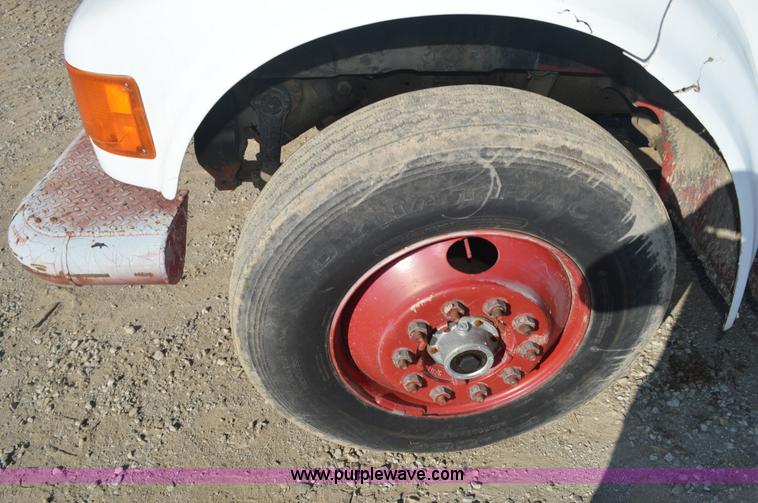 image for item BM9332 1997 International 4700 flat dump bed truck