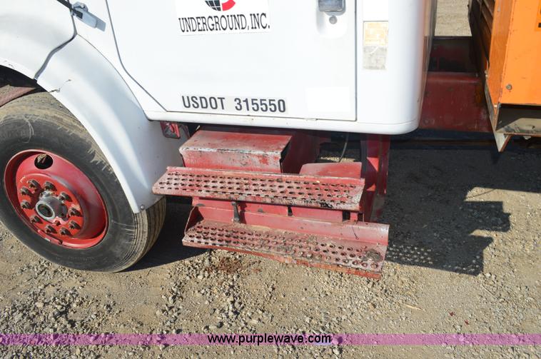 image for item BM9332 1997 International 4700 flat dump bed truck