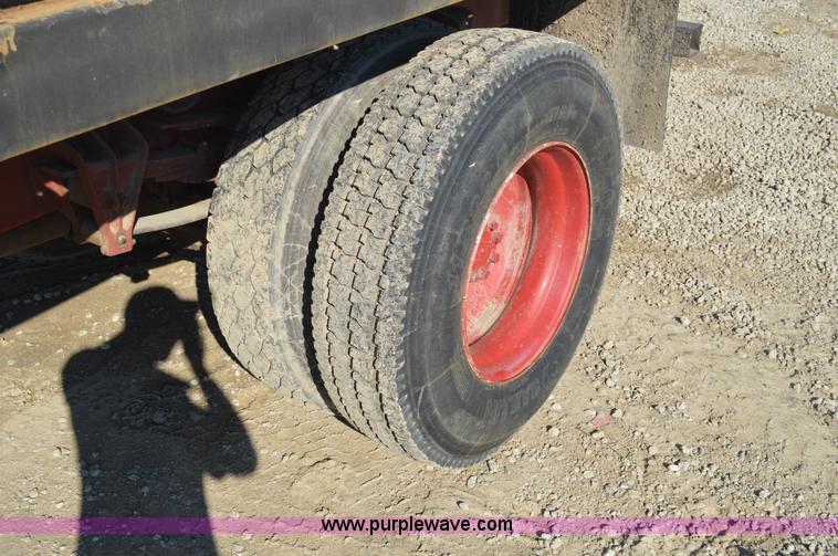 image for item BM9332 1997 International 4700 flat dump bed truck