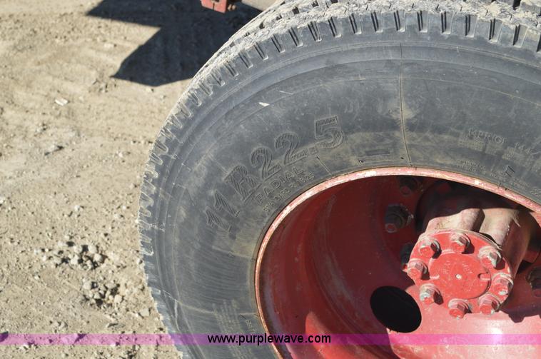 image for item BM9332 1997 International 4700 flat dump bed truck