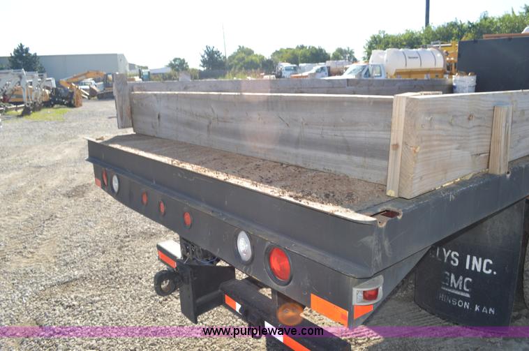 image for item BM9332 1997 International 4700 flat dump bed truck