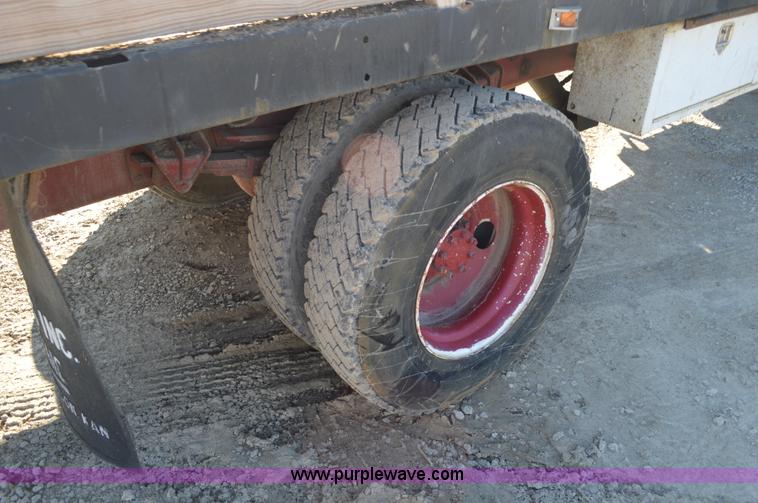 image for item BM9332 1997 International 4700 flat dump bed truck