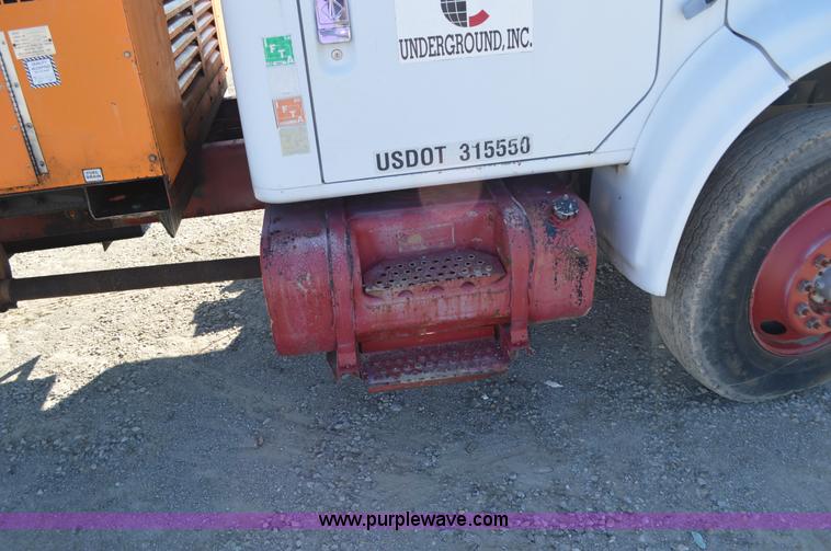 image for item BM9332 1997 International 4700 flat dump bed truck