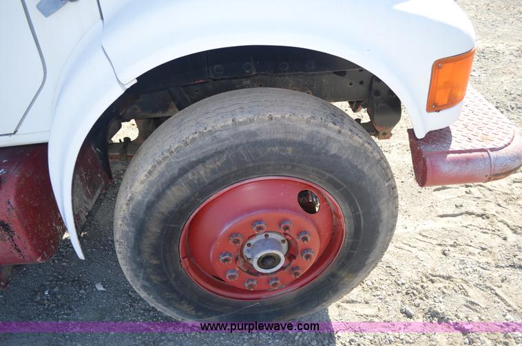 image for item BM9332 1997 International 4700 flat dump bed truck