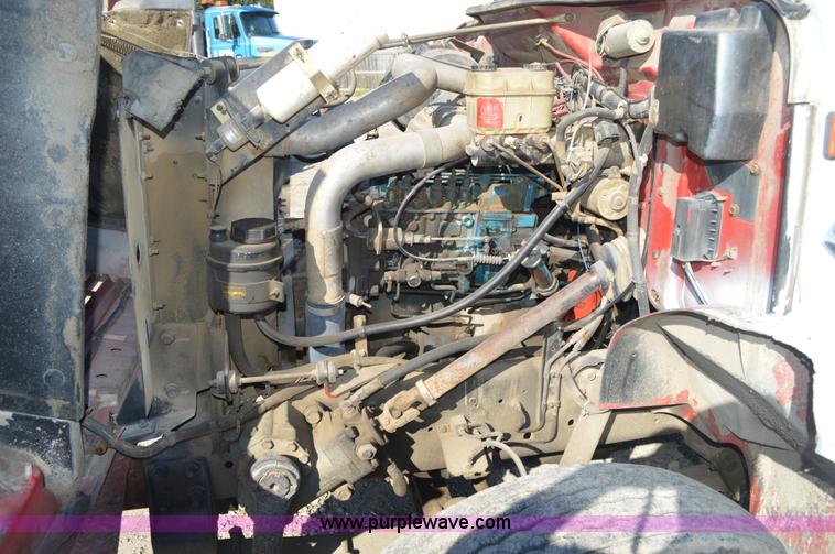 image for item BM9332 1997 International 4700 flat dump bed truck