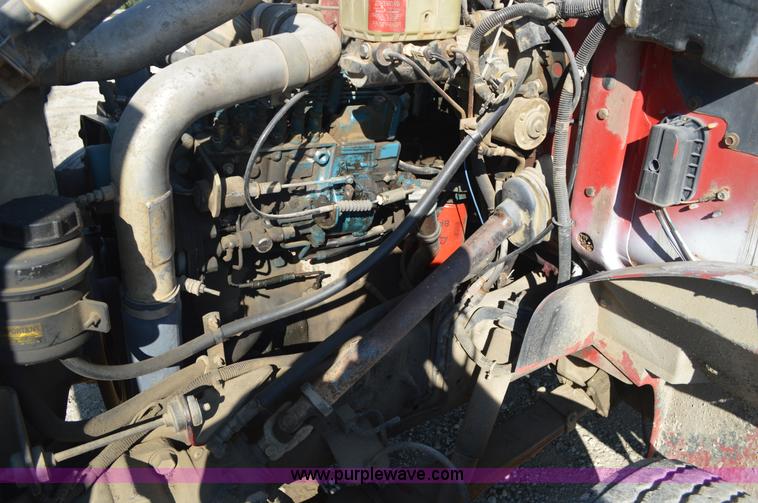 image for item BM9332 1997 International 4700 flat dump bed truck