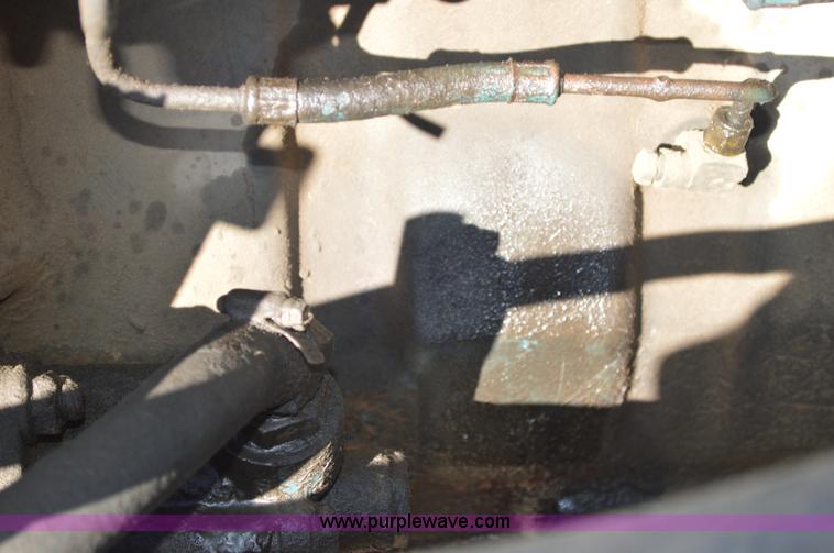 image for item BM9332 1997 International 4700 flat dump bed truck