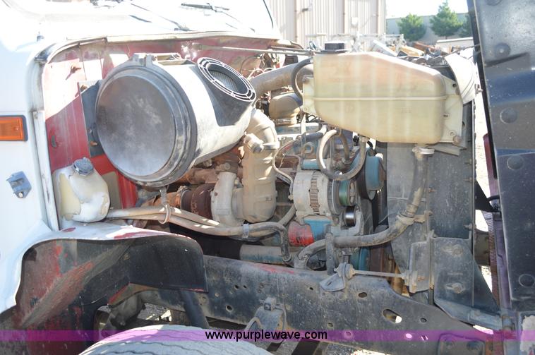 image for item BM9332 1997 International 4700 flat dump bed truck