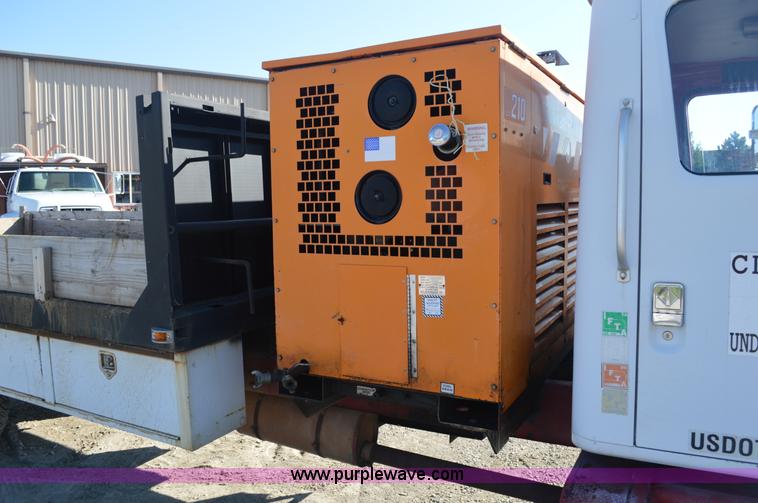 image for item BM9332 1997 International 4700 flat dump bed truck