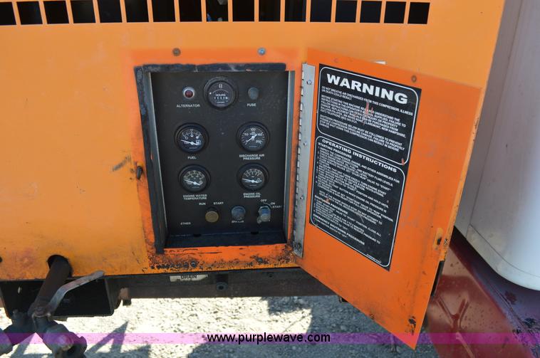 image for item BM9332 1997 International 4700 flat dump bed truck