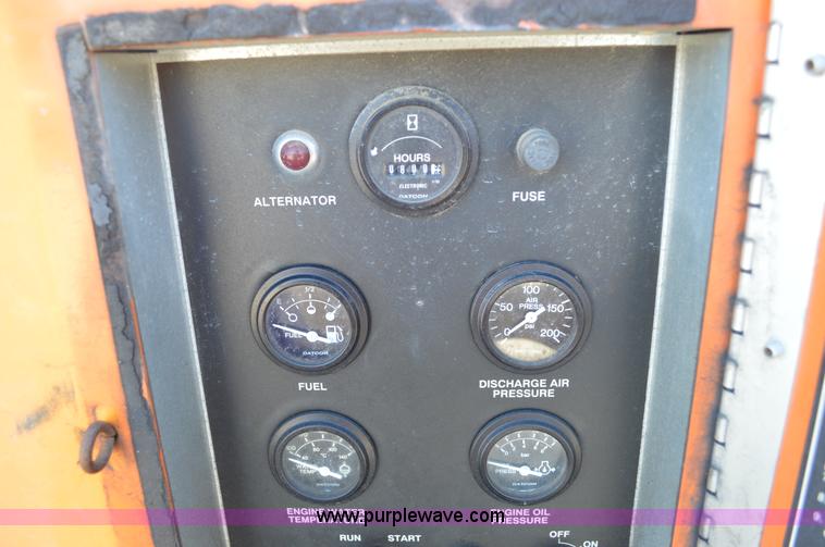 image for item BM9332 1997 International 4700 flat dump bed truck