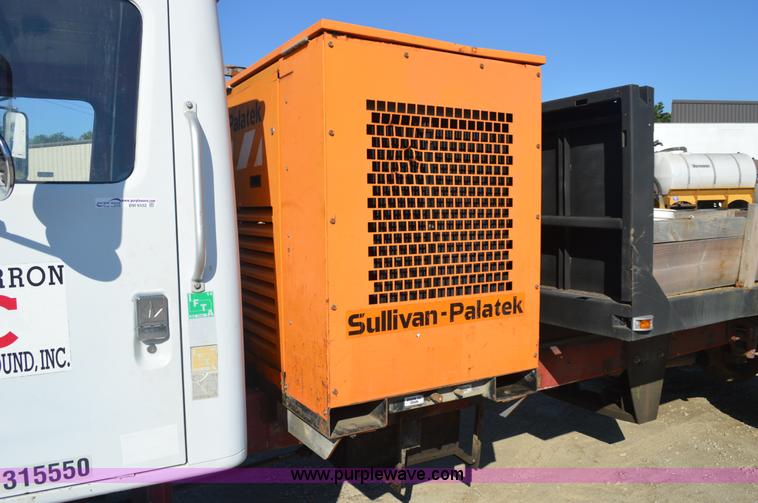 image for item BM9332 1997 International 4700 flat dump bed truck