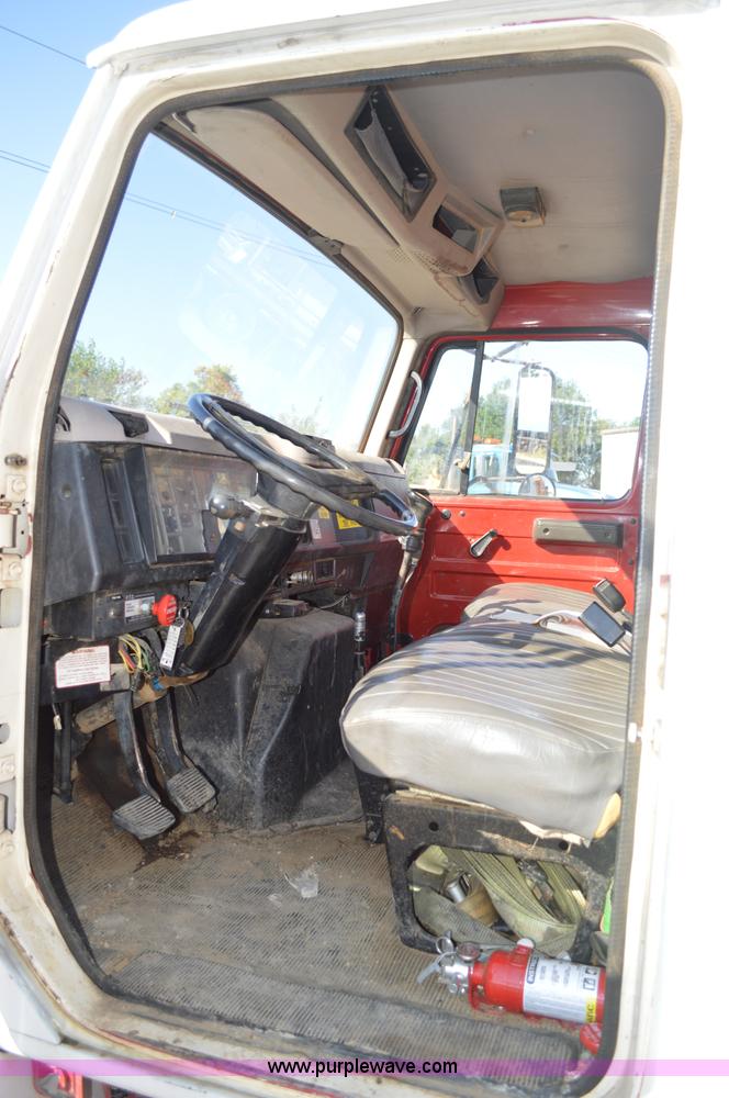 image for item BM9332 1997 International 4700 flat dump bed truck