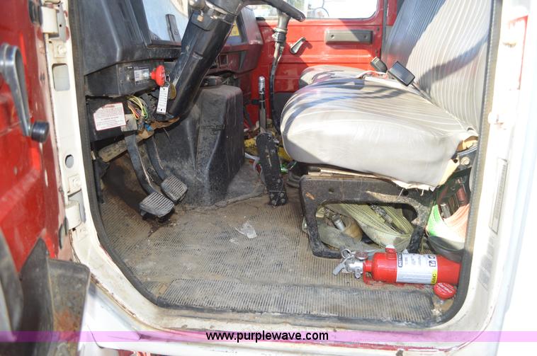 image for item BM9332 1997 International 4700 flat dump bed truck