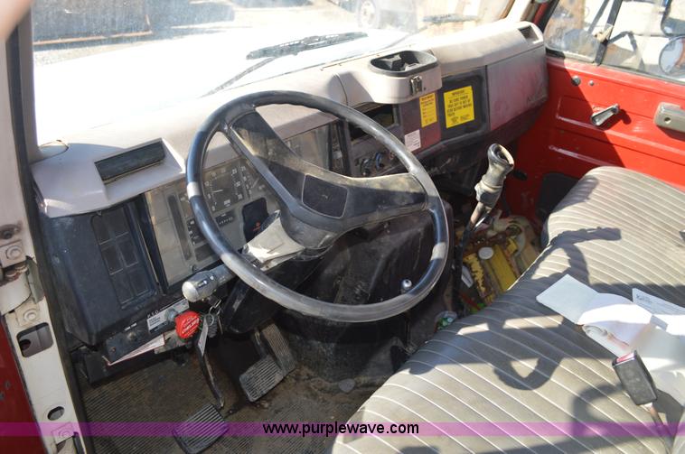 image for item BM9332 1997 International 4700 flat dump bed truck