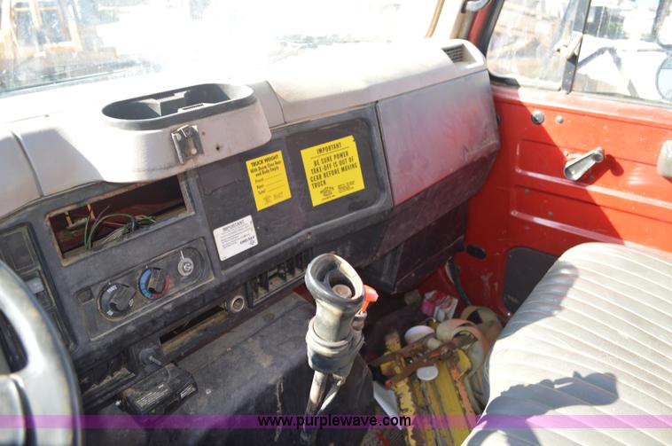 image for item BM9332 1997 International 4700 flat dump bed truck