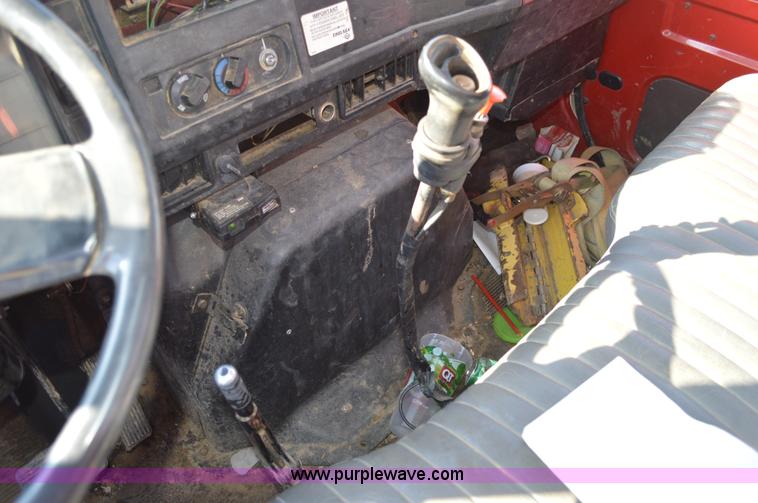 image for item BM9332 1997 International 4700 flat dump bed truck