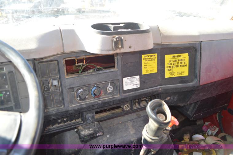 image for item BM9332 1997 International 4700 flat dump bed truck