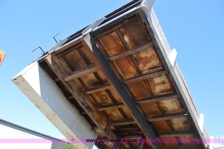 image for item BM9332 1997 International 4700 flat dump bed truck