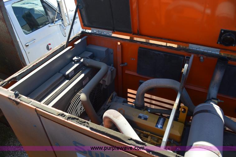 image for item BM9332 1997 International 4700 flat dump bed truck