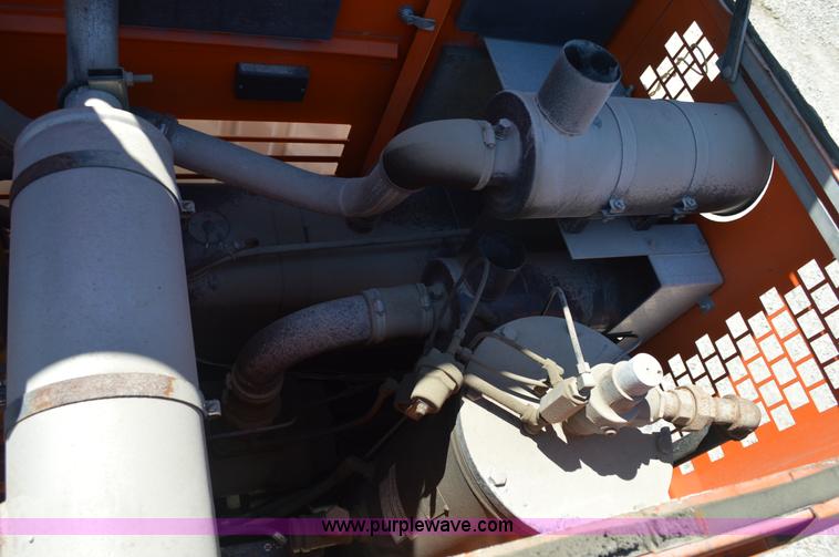 image for item BM9332 1997 International 4700 flat dump bed truck