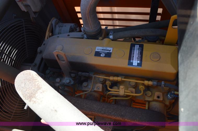 image for item BM9332 1997 International 4700 flat dump bed truck