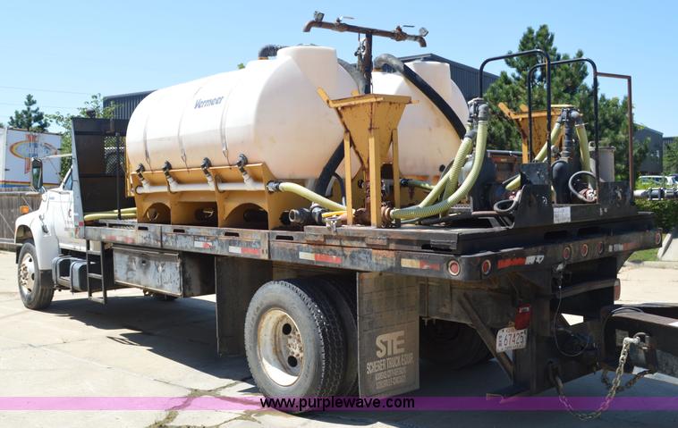 image for item BM9333 1998 Ford F800 Super Duty flatbed truck with mud mixer