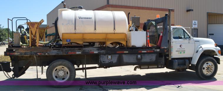 image for item BM9333 1998 Ford F800 Super Duty flatbed truck with mud mixer