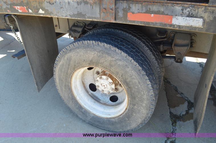 image for item BM9333 1998 Ford F800 Super Duty flatbed truck with mud mixer