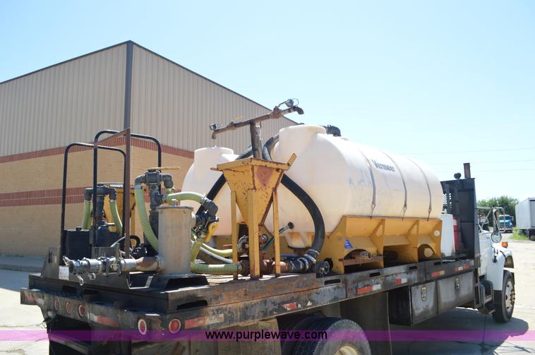 image for item BM9333 1998 Ford F800 Super Duty flatbed truck with mud mixer