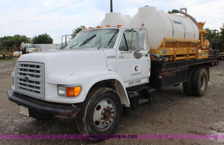 image for item BM9337 1999 Ford F800 flatbed truck with mud mixer