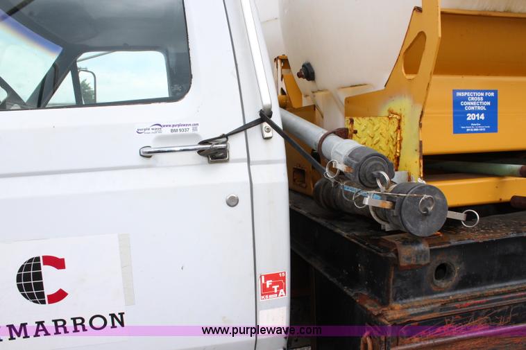 image for item BM9337 1999 Ford F800 flatbed truck with mud mixer