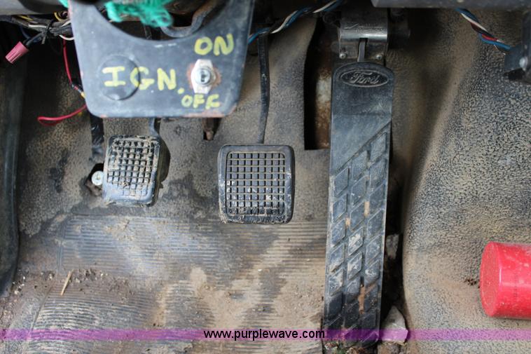 image for item BM9337 1999 Ford F800 flatbed truck with mud mixer