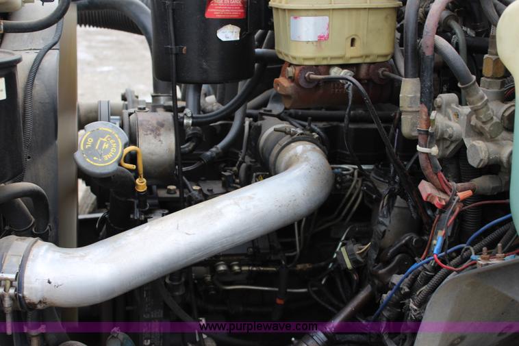 image for item BM9337 1999 Ford F800 flatbed truck with mud mixer