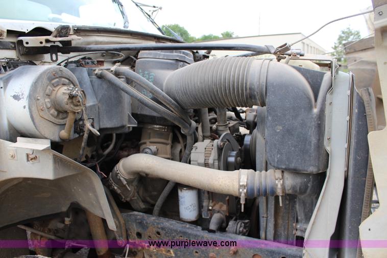 image for item BM9337 1999 Ford F800 flatbed truck with mud mixer