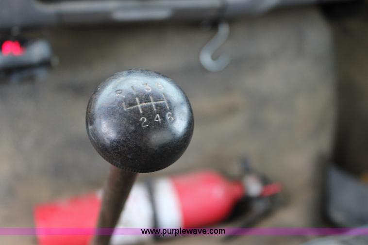 image for item BM9337 1999 Ford F800 flatbed truck with mud mixer