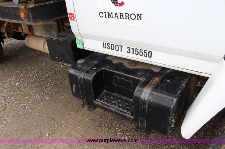 image for item BM9337 1999 Ford F800 flatbed truck with mud mixer