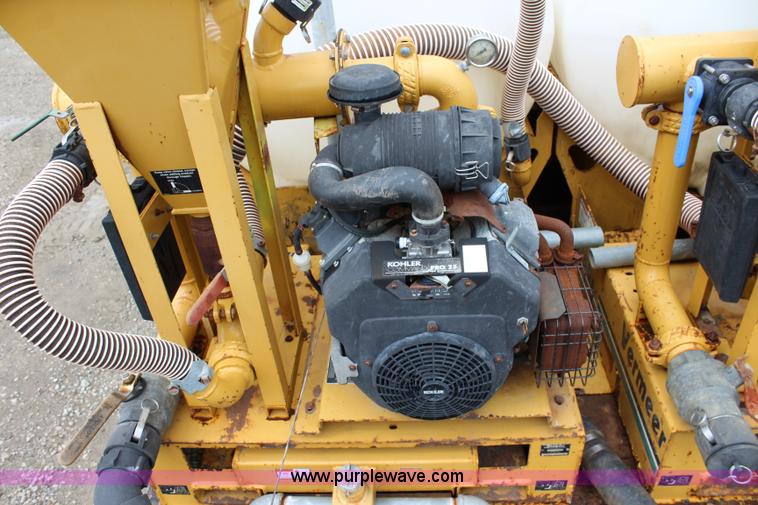 image for item BM9337 1999 Ford F800 flatbed truck with mud mixer