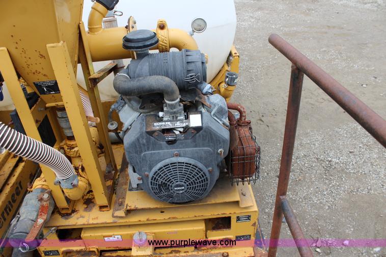 image for item BM9337 1999 Ford F800 flatbed truck with mud mixer