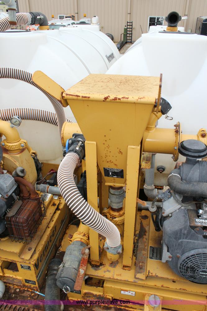 image for item BM9337 1999 Ford F800 flatbed truck with mud mixer