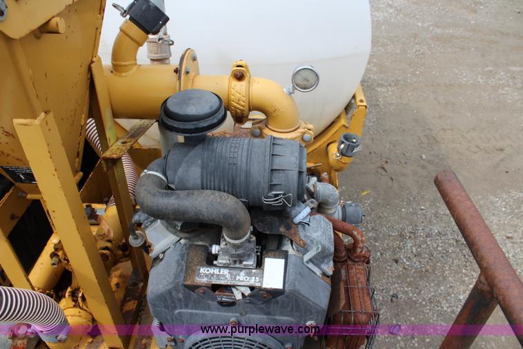 image for item BM9337 1999 Ford F800 flatbed truck with mud mixer