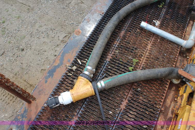 image for item BM9337 1999 Ford F800 flatbed truck with mud mixer