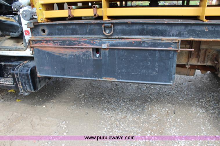 image for item BM9337 1999 Ford F800 flatbed truck with mud mixer