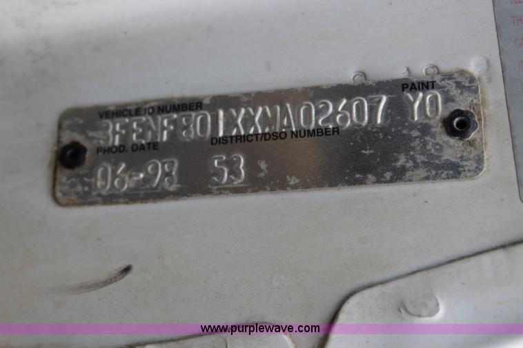 image for item BM9337 1999 Ford F800 flatbed truck with mud mixer