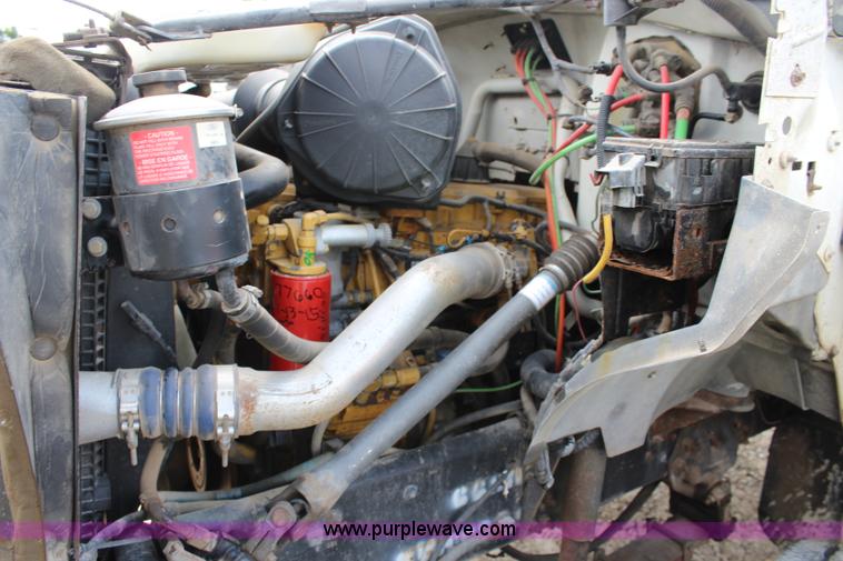 image for item BM9338 2000 Ford F750 flatbed truck with mud mixer